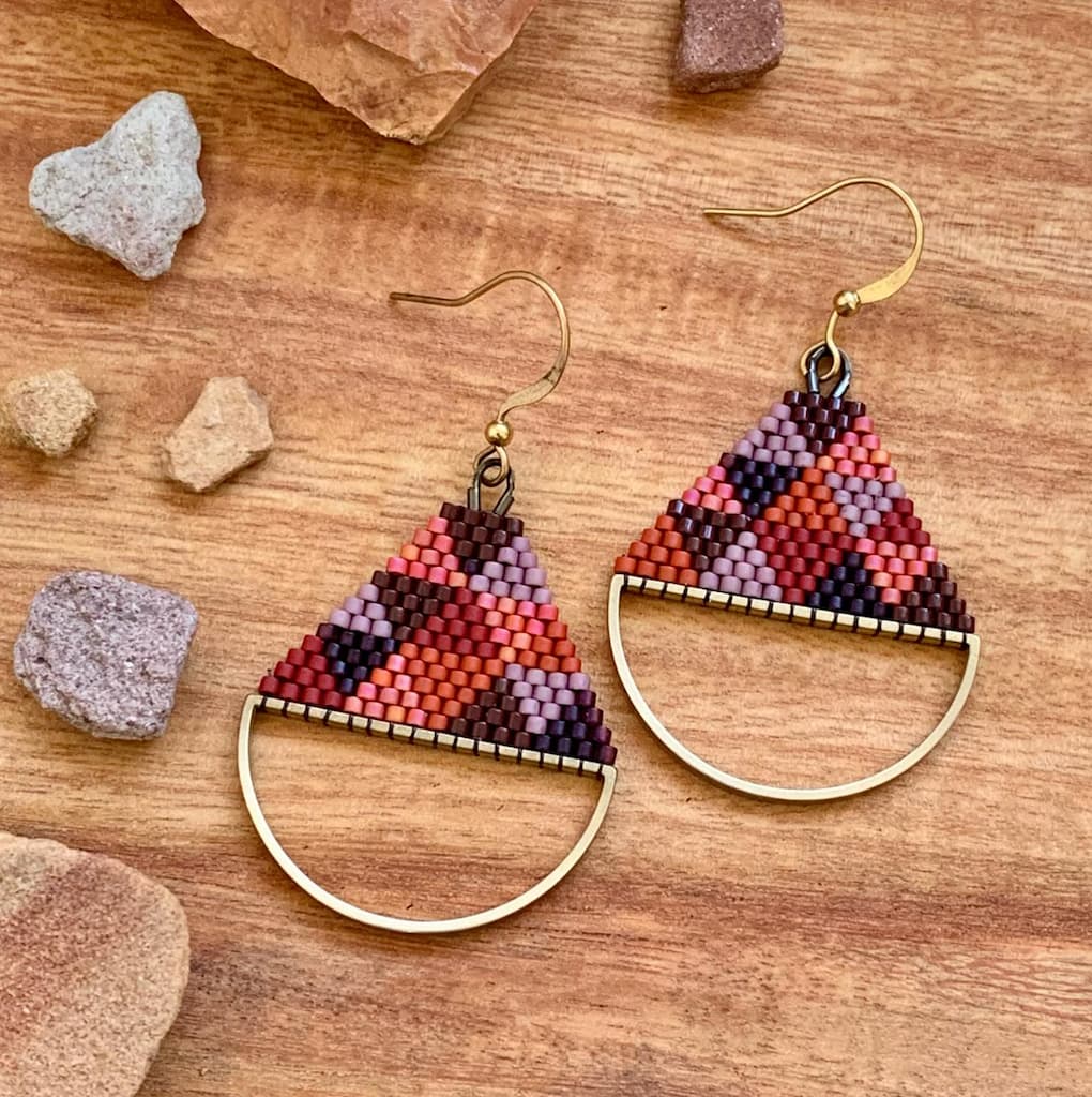 Bead earrings with brass crescent